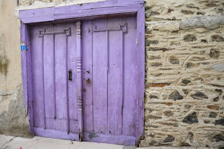 purple colored wooden doorの写真素材