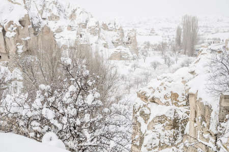 Capadocia under snow in Turkey during winterの写真素材