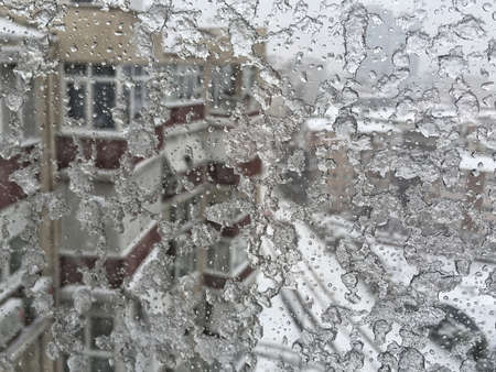 Snow winter blizzard on city streetsの写真素材