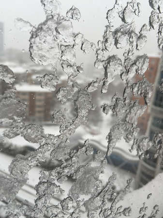 Snow winter blizzard on city streets