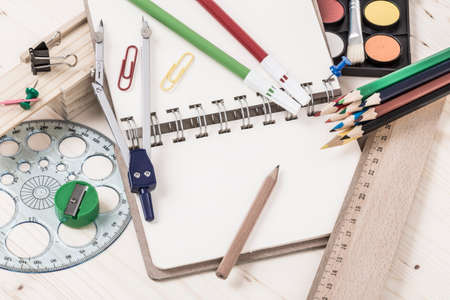 back to school template with multiple stationary on wooden table