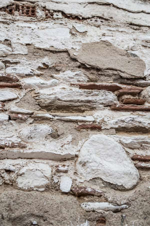 An old brick wall as a backgroundの写真素材