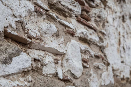 An old brick wall as a backgroundの写真素材