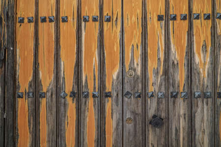 an old wooden door as a backgroundのeditorial素材