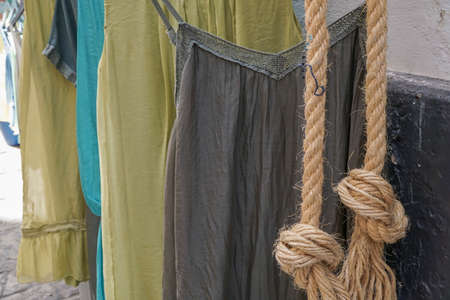 hanged clothes in order to sellの写真素材