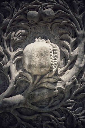Carved pomegranate on marble in Andalucia, Spainの写真素材