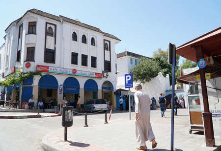 People in the center of Medina town in Chefchaouen, Morocco. Chefchaouen or Chaouen where the most noted for its narrow streets and neighborhoods painted in vivid blue colors.のeditorial素材