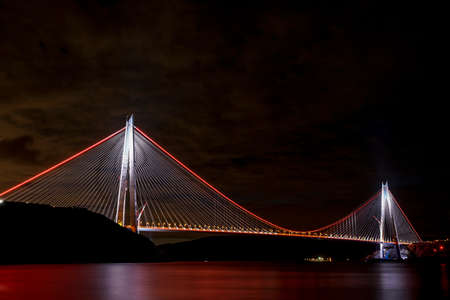 Yavuz Sultan Selim Bridge with lights at night in Istanbul, Turkey