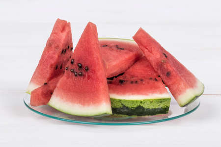 watermelon slices on a wooden table