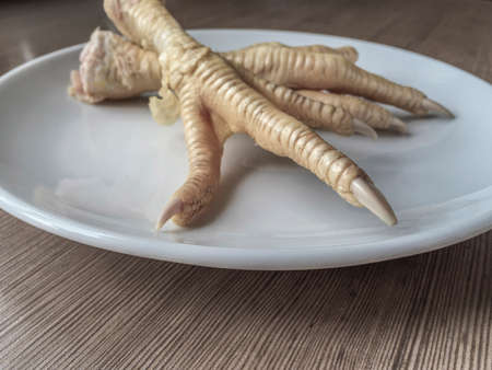 Raw chicken feet in order to cookの写真素材