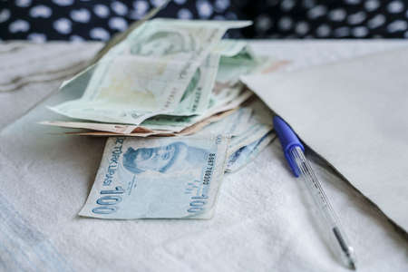 Turkish Lira banknotes on table