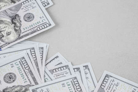 Some American Dollars as a border on grey backgroundの写真素材