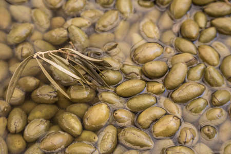 pickled green olives as a background