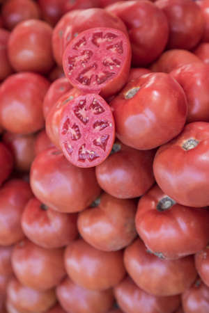 pile of ripe red tomatoes as a background