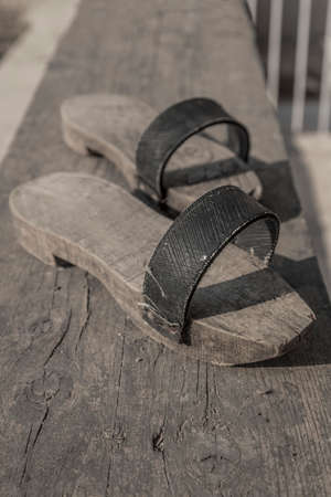 pair of old turkish handmade wooden slippersの写真素材