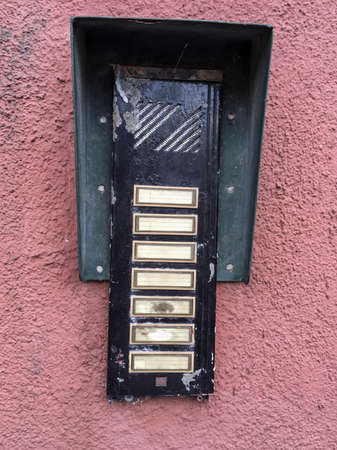 doorbels on wallの写真素材