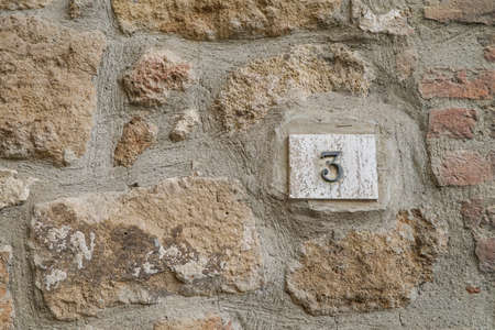 number three on a wall with copy space