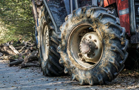 close up tyre of a tractor covered in mud