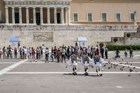 Every sunday the ceremonial changing of Evzon guard can be watched in front of the Tomb of the Unkown Soldier in Athens, Greeceのeditorial素材