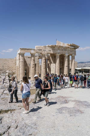 People visiting The Ancient Athenian Acropolis of Athens in Greece.のeditorial素材