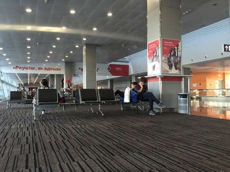 People waiting in terminal D of Borispol International Airport for departure in Kiev, Ukraine.のeditorial素材