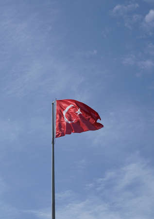 Turkey's flag flutters in the blue skyのeditorial素材
