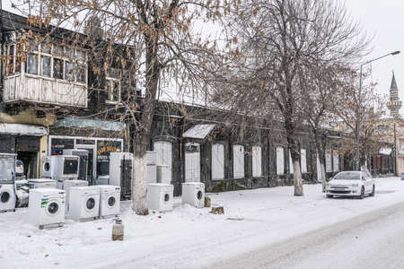 Secondhand White Goods piled up outside of shop in Kars city of Turkey.
