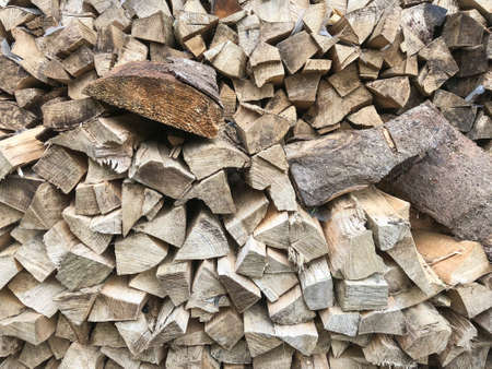 background with stacked firewoods