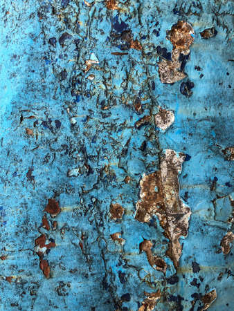 grunge and cracked blue colored backgroundの写真素材