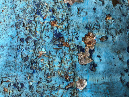 grunge and cracked blue colored backgroundの写真素材