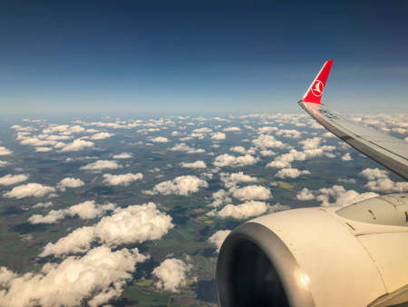 Kiev, Ukraine - May 05, 2019; Wing of Turkish airlines plane while flying in the air from Ukraine to Turkey.のeditorial素材