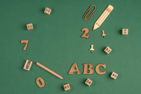 back to school template with stationeries on green backgroundの写真素材