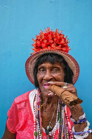 Havana, Cuba - May 06, 2017; A cuban woman holding a huge cigar in order to smoke in Havana, Cuba.のeditorial素材