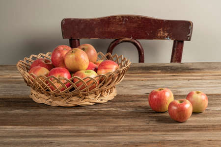 organic ripe apples on a wooden table with copy spaceの写真素材