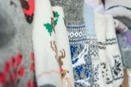 hanged knitted woven socks as a background