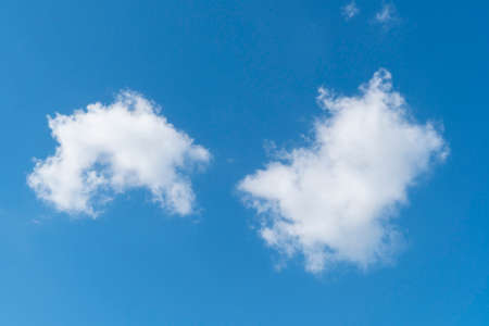 blue sky background with white soft clouds with copy spaceの写真素材