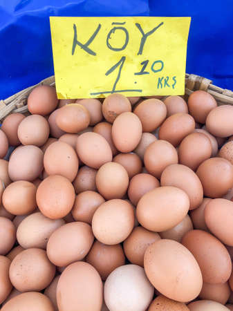 pile of eggs with label in Turkish saying eggs coming from the villageの写真素材
