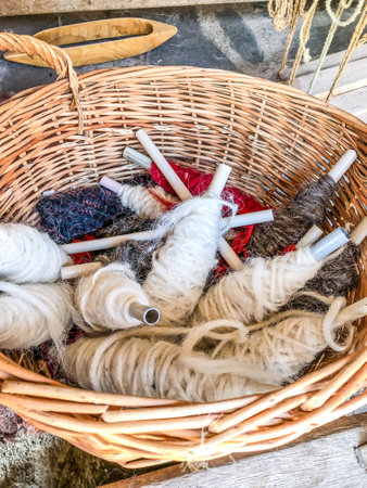closeup balls of wool in a basketの写真素材