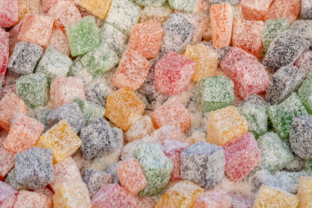 pile of colorful turkish delights as a backgroundの写真素材