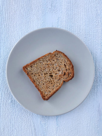 a slice of bread on the table with copy space