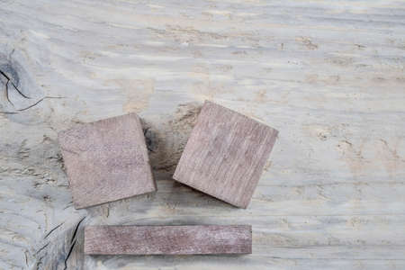 closeup three blank wooden cubes with copy space on the tableの写真素材