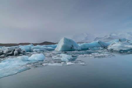 Background with Icebergs in the ice field on a lagoon, arctic landscape, in Iceland, Europeの写真素材