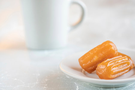 Traditional dessert with sherbet, one of the traditional sweet food known as tulumba in Turkish,...