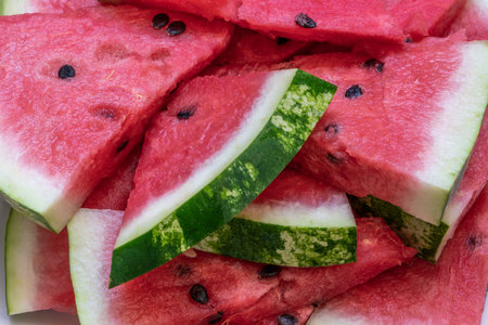 watermelons, delicious fresh summer fruit background with closeup watermelon slices. berry beautiful food surface or background concept photo for summertime with selective focusの写真素材