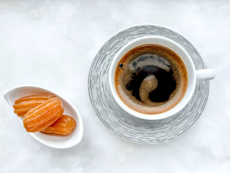 Coffee, Turkish Coffee with traditional dessert with syrup sherbet, one of traditional dessert known...