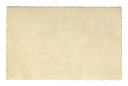 Vintage style brown old paper texture or background, with uneven torn edges.の写真素材