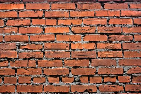 Old grunge red brick wall texture or background.の写真素材