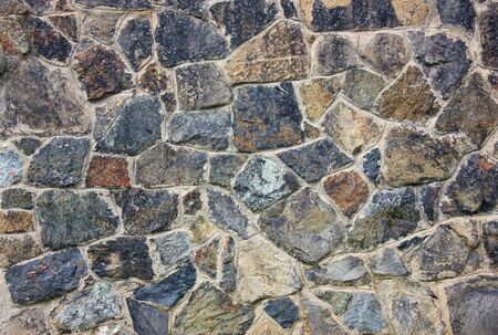 Stone Wall with Random Tiled Pattern. Background and Texture for text or imageの写真素材