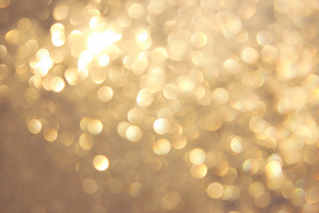 Golden yellow vivid bokeh in soft color style, blured background, postcard.の写真素材