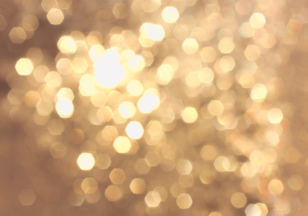 Golden yellow vivid bokeh in soft color style, blured background, postcard.の写真素材